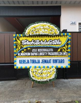 Papan Bunga Duka di Pemenang